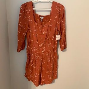women’s floral rusty-orange color romper!